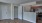 a kitchen with white cabinets